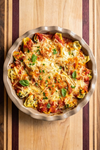 Plant-based baked stuffed shells made with The Better Butchers Italian-style ground in marinara sauce