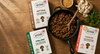 The Better Butchers Natural, Italian and Chorizo gluten-free, soy-free plant-based grounds beside a skillet of browned ground