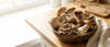 A bowl of fresh mushrooms, the richest dietary source of the antioxidant ergothioneine.