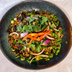 Thai-style larb made with The Better Butchers plant-based ground, cilantro, red onion, scallions, and chili
