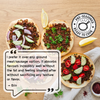 Three loaded flatbreads topped with seasoned The Better Butchers plant-based ground, fresh herbs, and tomatoes.